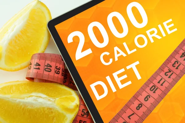 2000 calorie diet on tablet. — Stock Photo, Image