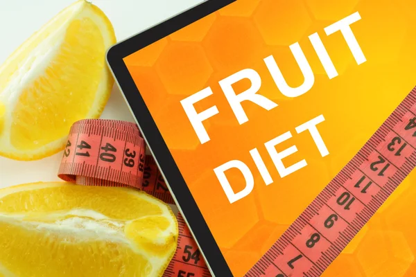 Fruit diet on tablet. — Stock Photo, Image