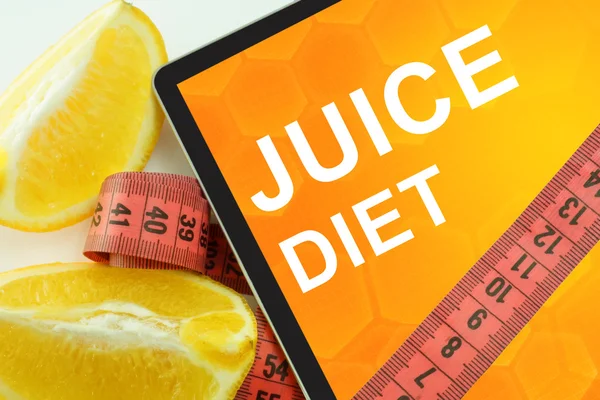 Juice diet on tablet. — Stock Photo, Image