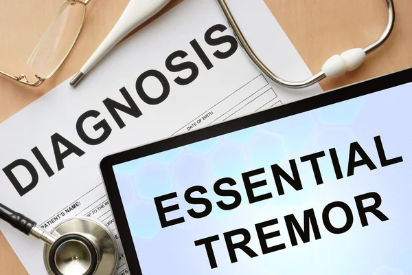 Comprimé avec diagnostic tremblement essentiel et stéthoscope . — Photo