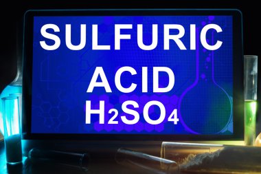 Tablet with chemical formula of  sulfuric acid. clipart