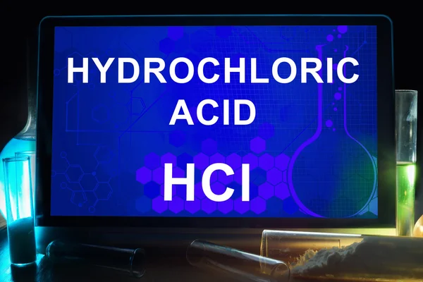 Tablet with chemical formula of  hydrochloric acid. — Stock Photo, Image