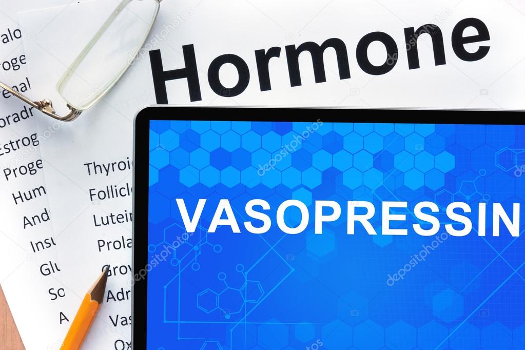 Papers with hormones list and tablet  with words  vasopressin.