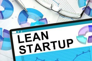 Lean Startup On tablet with graphs. clipart