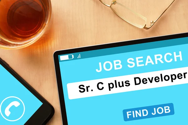 Tablet with Sr C plus Developer on job search site. — Stock Photo, Image