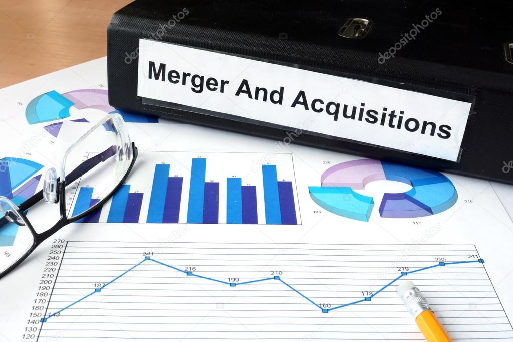 File folder with Merger and Acquisition and financial graphs.