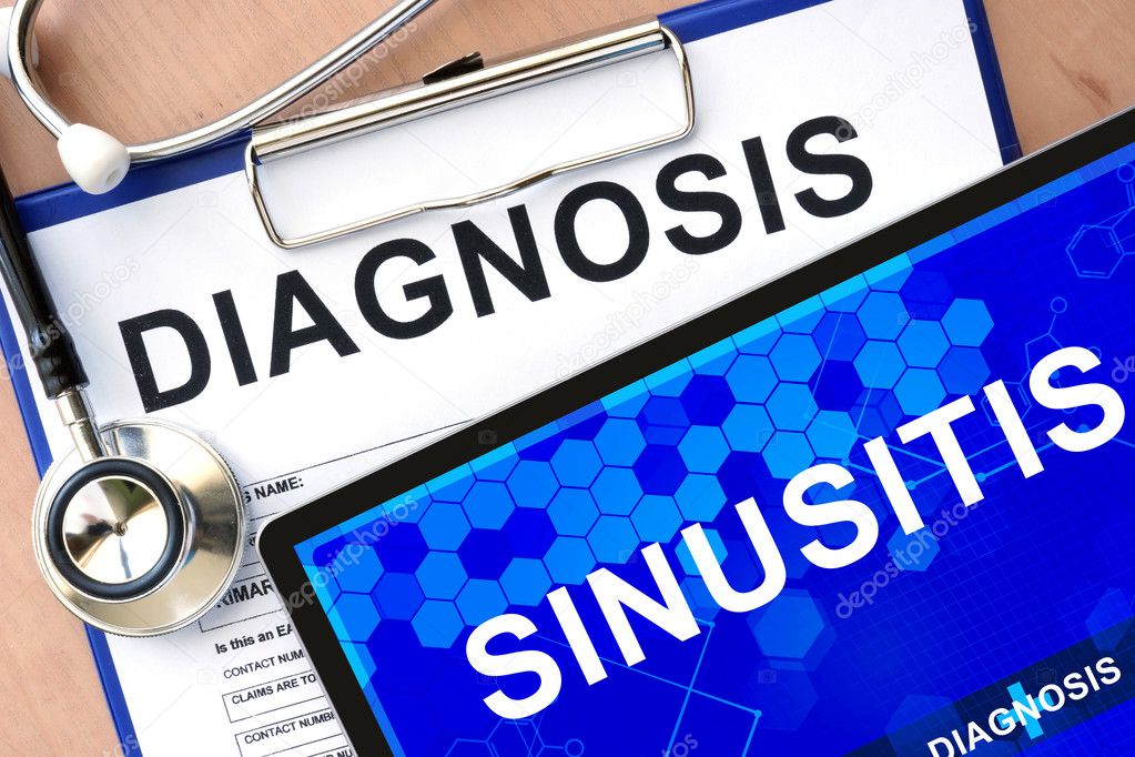 Form with diagnosis and tablet with sinusitis