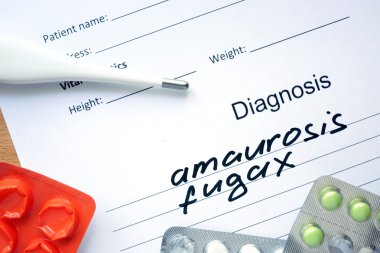 Diagnostic form with diagnosis Amaurosis fugax and pills. clipart