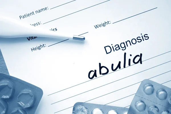 Diagnostic form with diagnosis abulia and pills. — Stock Photo, Image