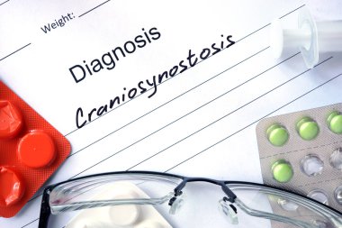 Diagnosis Craniosynostosis and tablets.