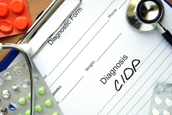 Діагностика Хронічна запальна демієлінізуюча полінейропатія (CIDP) та таблетки . — стокове фото