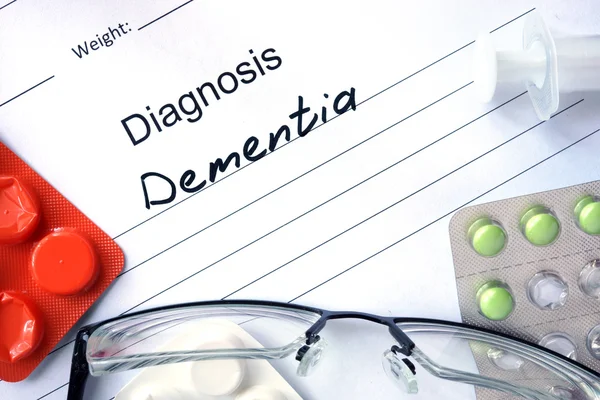 Diagnosis Dementia and tablets. — Stock Photo, Image