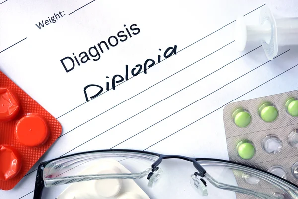 Diagnose Diplopie und Tabletten. — Stockfoto