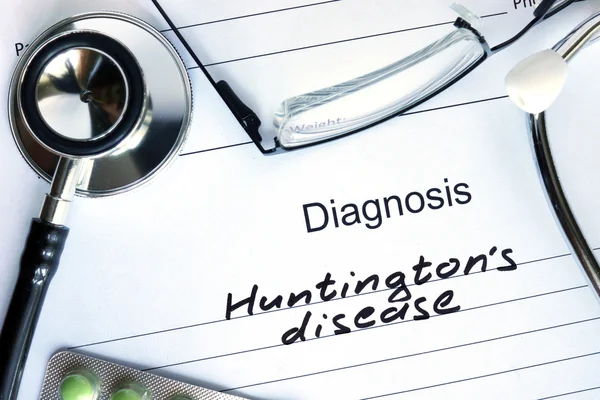 Diagnoza Huntingtons Chorób i tabletki. — Zdjęcie stockowe