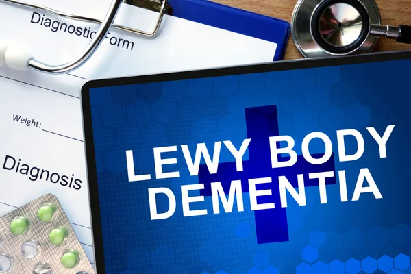 Diagnostische formulier met diagnose Lewy body-dementie en pillen. — Stockfoto