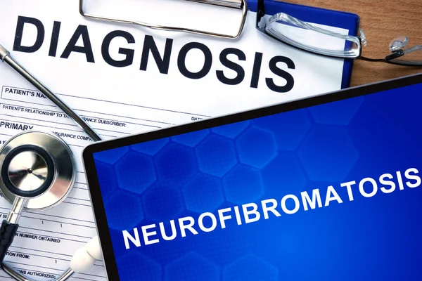 Forma diagnóstica con diagnóstico Neurofibromatosis y píldoras . — Foto de Stock