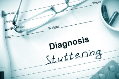 Diagnosis  Stuttering, pills and stethoscope. clipart