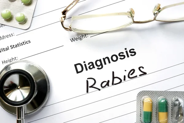 Diagnosis  Rabies, pills and stethoscope. — Stock Photo, Image