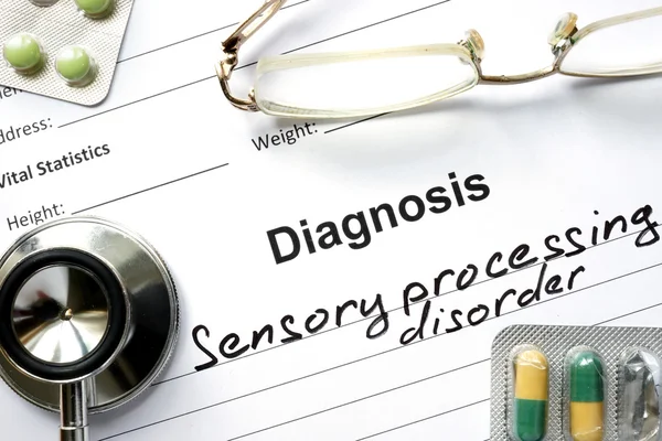Diagnóstico Trastorno de procesamiento sensorial, pastillas y estetoscopio . —  Fotos de Stock