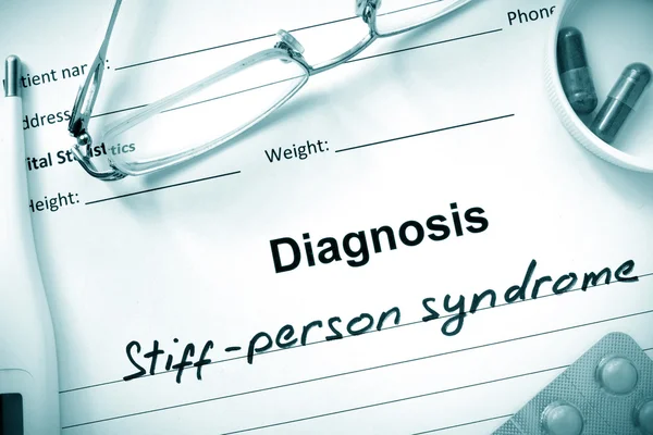Diagnose Steif-Personen-Syndrom, Pillen und Stethoskop. — Stockfoto