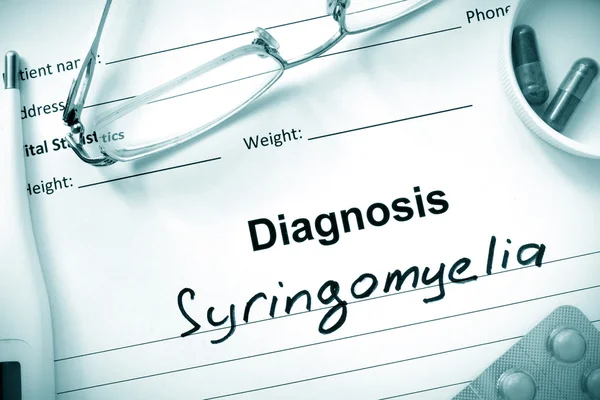 Diagnosis  Syringomyelia, pills and stethoscope. — Stock Photo, Image