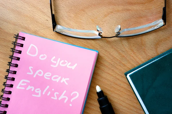 Notera med ord talar du engelska? — Stockfoto