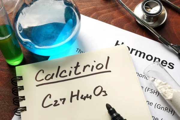 Calcitriol hormonal escrito en el cuaderno . — Foto de Stock