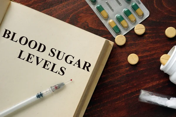 Blood sugar levels  written on a book. — Stock Photo, Image