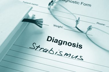 Diagnosis list with Strabismus and glasses. clipart