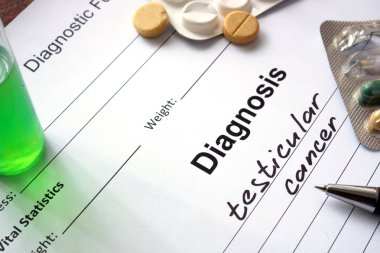 Tanı testis kanseri tanı formu ve hapları ile yazılmış.