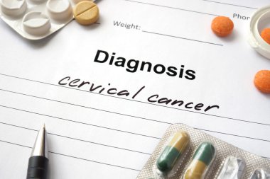 Diagnosis cervical cancer written in the diagnostic form and pills. clipart