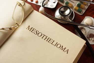 Book with diagnosis  Mesothelioma. clipart