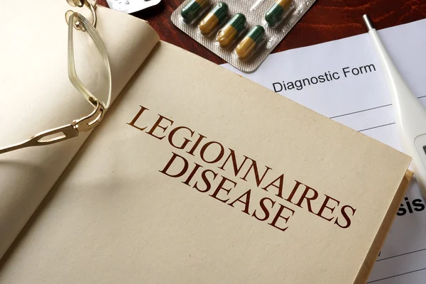 Kniha s diagnózou Legionářská nemoc. — Stock fotografie
