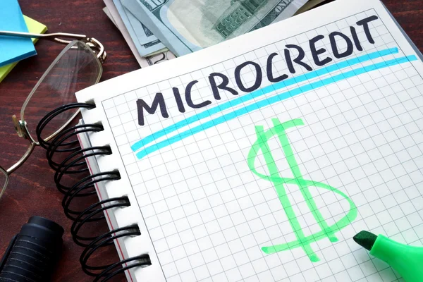 Microcredit written on a notebook. Business concept. — Stock Photo, Image