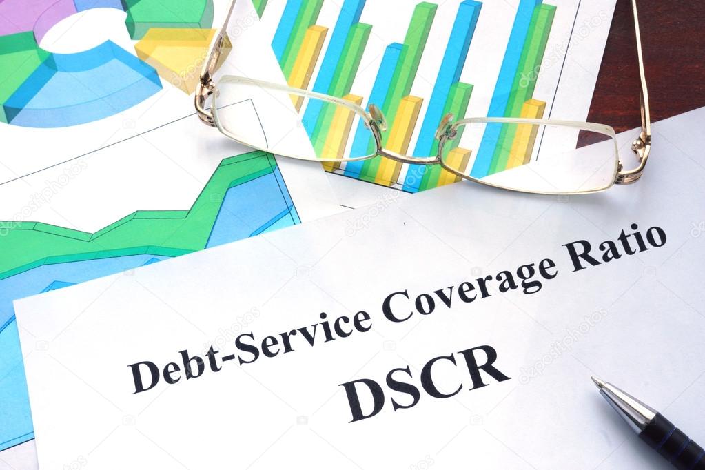 Debt Service Coverage Ratio   DSCR form on a table. Business concept.