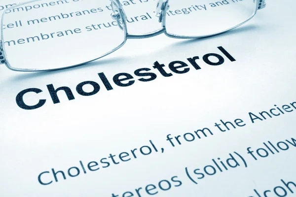 Papier z słowo cholesterolu cukrzycy i okulary. — Zdjęcie stockowe