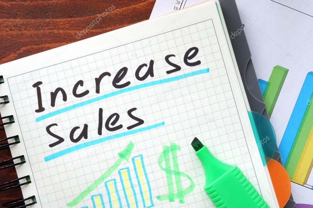 Increase sales concept  written in a notebook