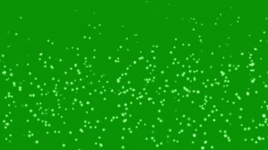 Yeşil ekran arkaplanlı uçan parçacıklar hareket grafikleri
