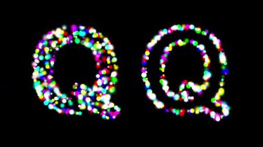 İngilizce alfabe Q düz siyah arkaplan üzerinde renkli bokeh ışıkları etkisi