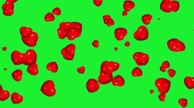 Yeşil ekran arkaplanlı kırmızı kalplerin hareket grafikleri