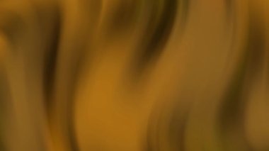 Koyu sarı yangın eğimli sıvı dalga arka planı. Hareketli sıvı duvar kağıdı. Soldan sağa doğru pürüzsüz akıyor. 4K hareketli grafik canlandırması.