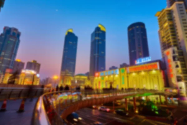 Shanghai skyline à noite fora de foco . — Fotografia de Stock