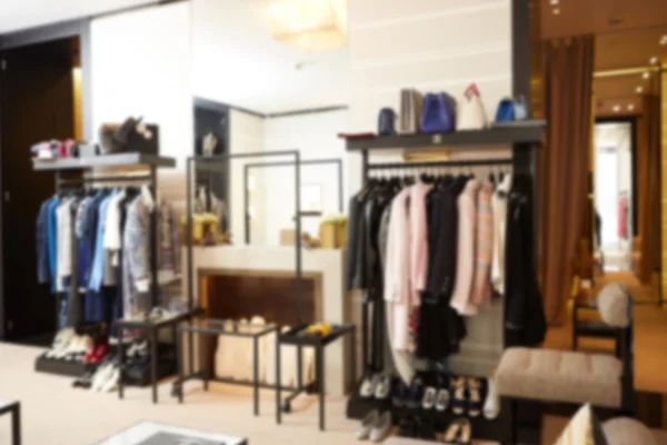 Blurred clothing boutique interior background — Stock Photo, Image