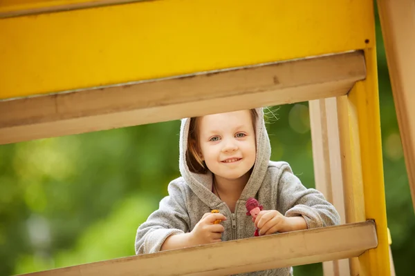 Girl playing at the playground — Stock Photo, Image