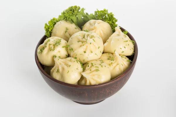 Khinkali cooked on a ceramic plate — Stock Photo, Image