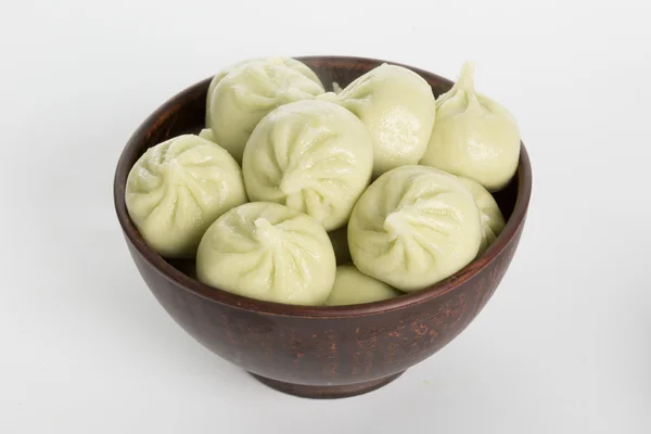 Khinkali cooked on a ceramic plate — Stock Photo, Image