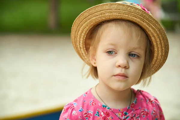 Cute kid girl wearing hat outdoors — Stock Photo, Image