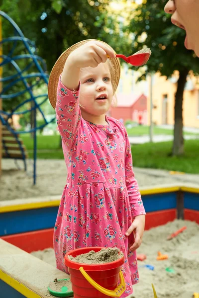 Child on playground in summer park — Stock Photo, Image