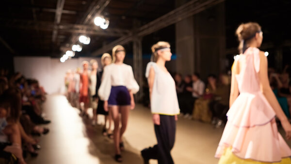 Fashion runway out of focus. The blur background