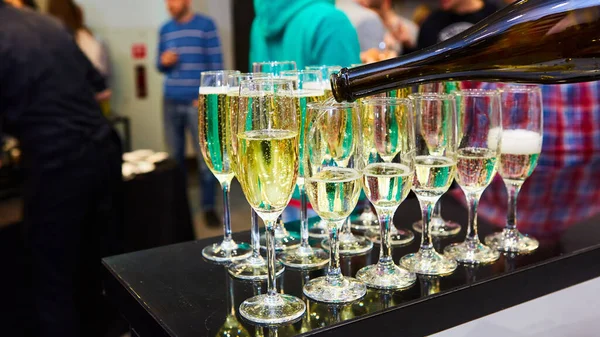 Champagne pouring into the glass — Stock Photo, Image